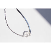 Nomia Crystal Shell Necklace in Silver/Quartz